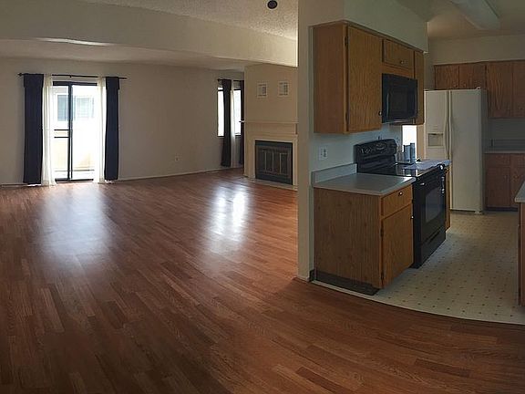 Open living with fireplace