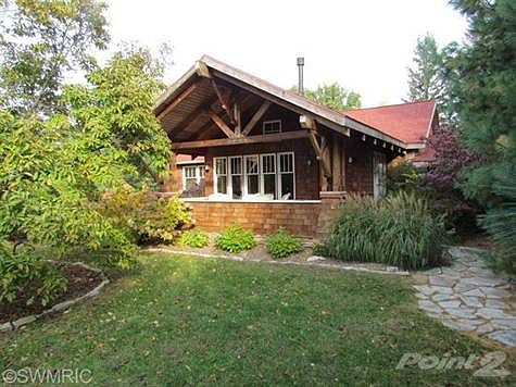 Perfect bungalow with Lake Michigan Deeded Access.  Totally renovated with a beautiful finish package.