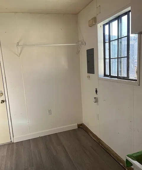 utility room with washer dryer hookups attached to garage