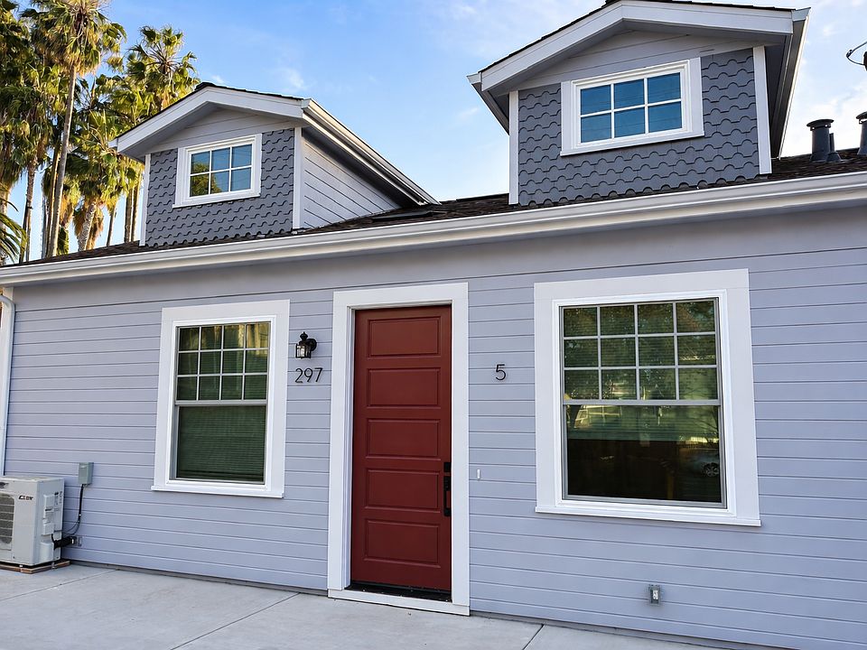 Welcome home to Unit 5. Brand new construction with a signature red front door, modern gray siding, and beautiful palm tree surroundings in the heart of Downtown San Jose.