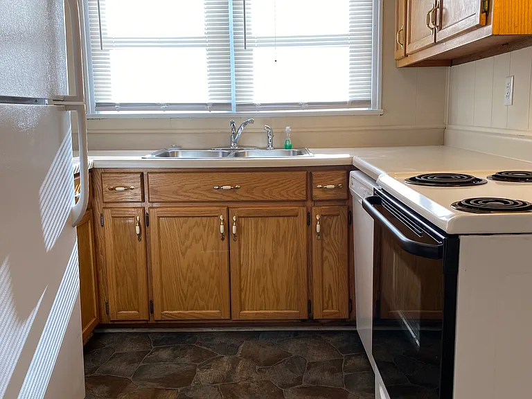 Refrigerator and stove included