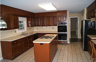 Spacious Kitchen w/ Cherry Cabinets