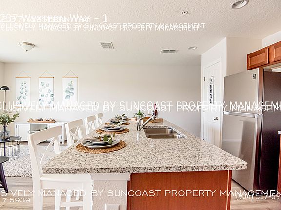 4th image of 9237 Western Way #1