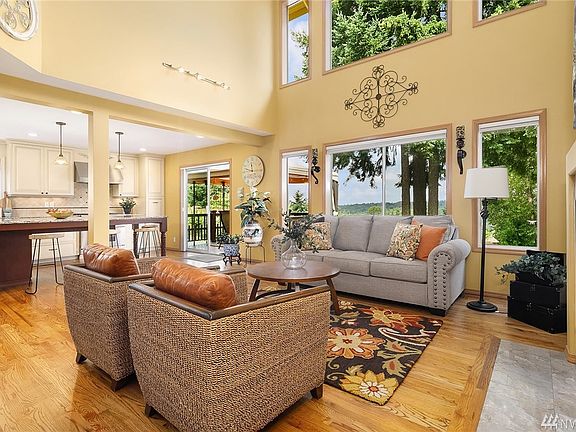 The open floor plan offers a great-room style area with kitchen, casual dining and family room blending into one beautiful area.