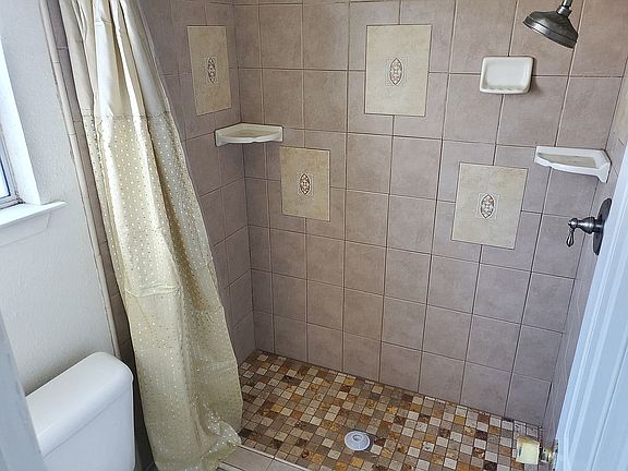Mosaic tiling in master bath