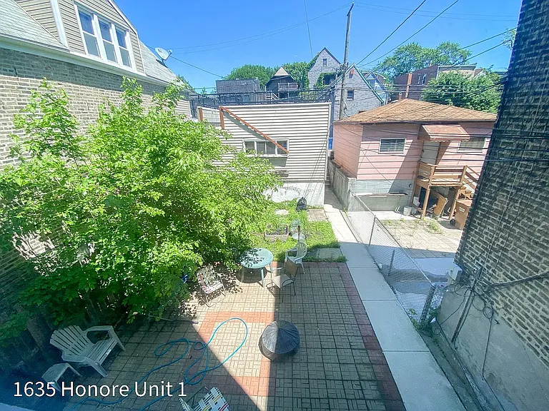 common area - rear patio & yard