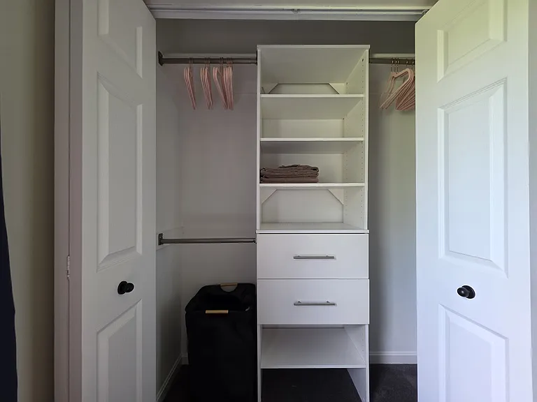 Organized clothing and shoe storage. Two sets of towels, hand towels, and washcloths and two sets of sheets, provided.