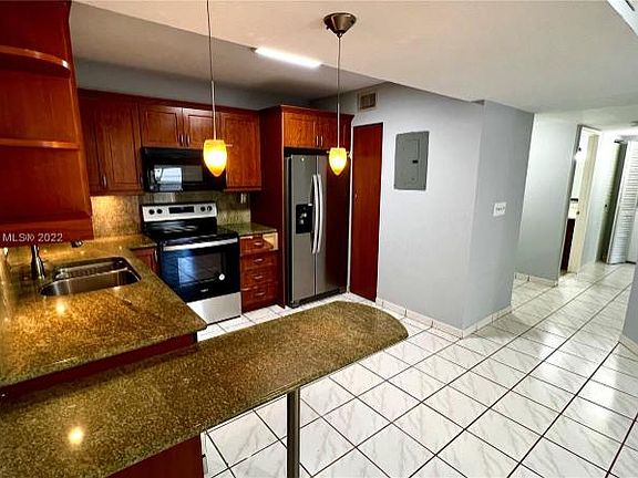 2nd image of 8811 SW 132nd Pl #308CW-IV