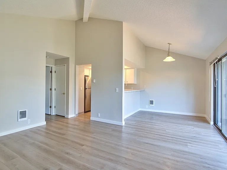 Vaulted ceilings in the living and dining rooms & all freshly painted.