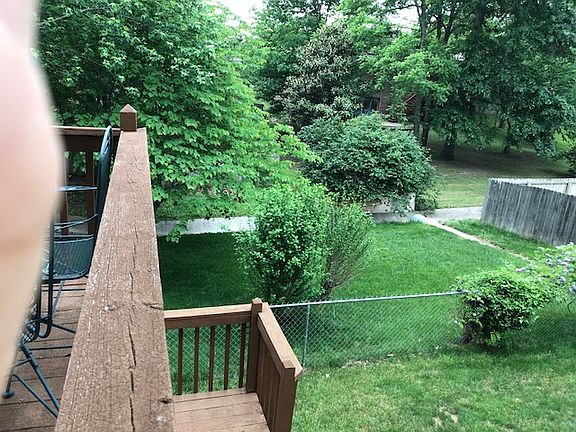 Partially fenced yard. 