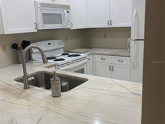 5th image of 622 Bird Bay Dr S APT 203