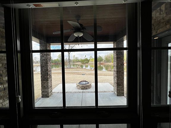 Living room rear window view / back porch