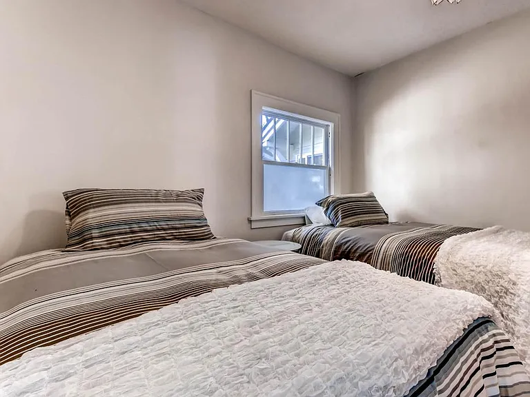 Relax in Comfy Double/Full Beds in One of Five Bedrooms