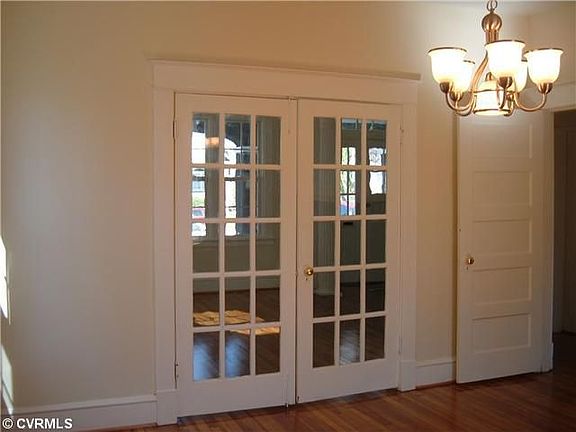 French doors separate formal living/dining rooms!