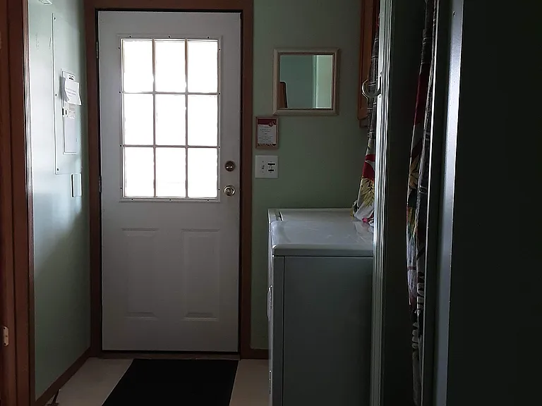 Washer and Dryer provided for all your laundry needs as well as a wall of cupboards for storage space