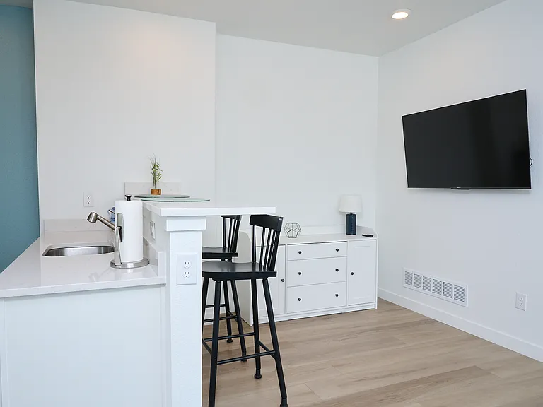 Wall mounted television is adjustable.