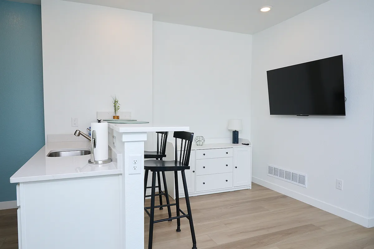 Wall mounted television is adjustable. - 938 Hearteye Trl