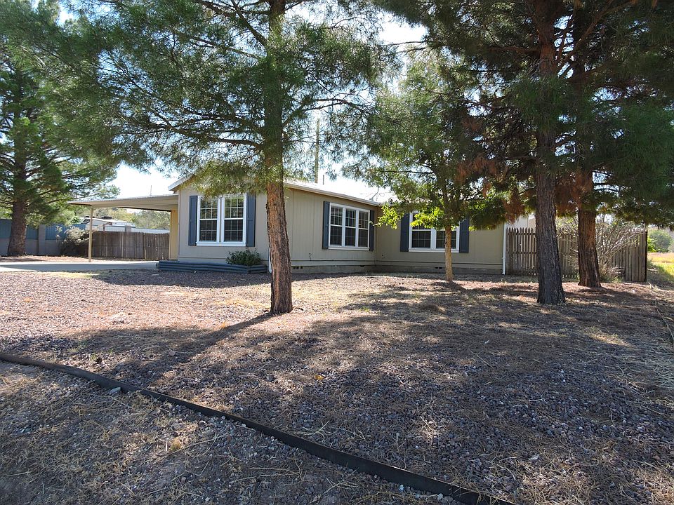 Front yard with xeriscaping for easy maintenance.