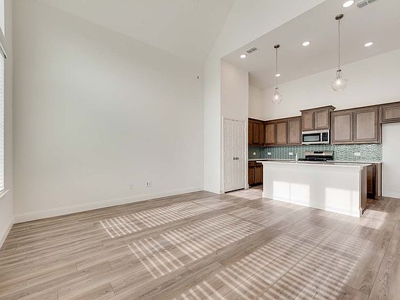 Mulberry floor plan featuring open-concept living, a breakfast area off the kitchen, and a private p