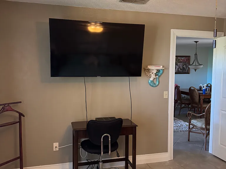 52" TV in master bedroom. basic cable included