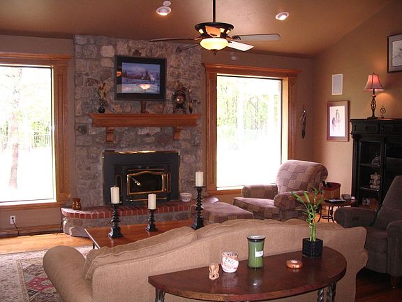 LIVING ROOM HAS HUGE WINDOWS