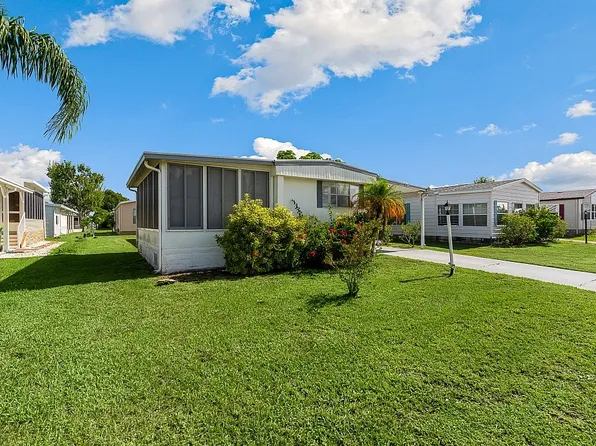 369 Dolphin Cir, Barefoot Bay, FL 32976