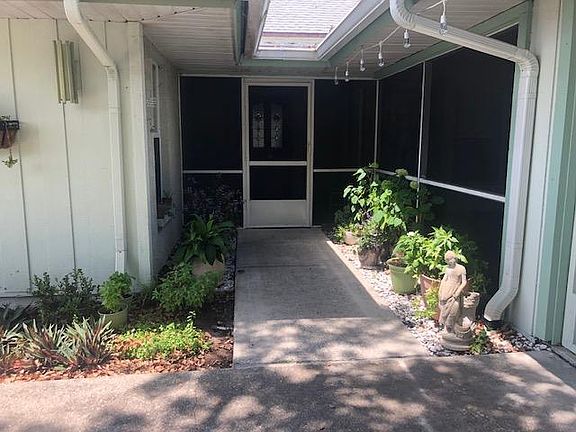Front porch, screened in.