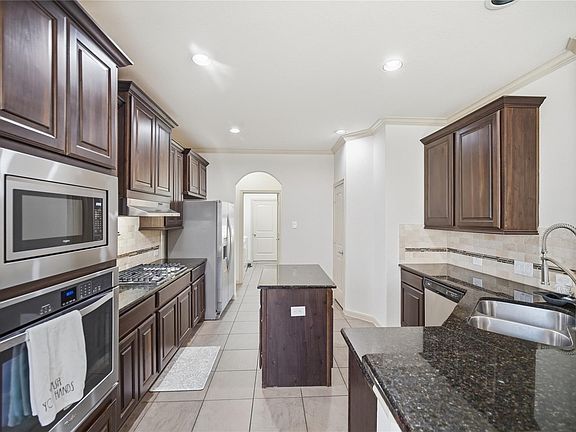 4th image of 11014 Sir Alex Dr
