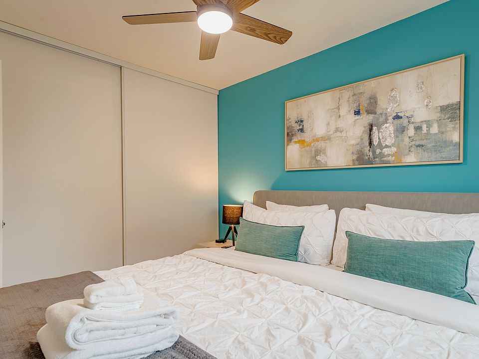 Cal King Bedroom with full closet with dresser.