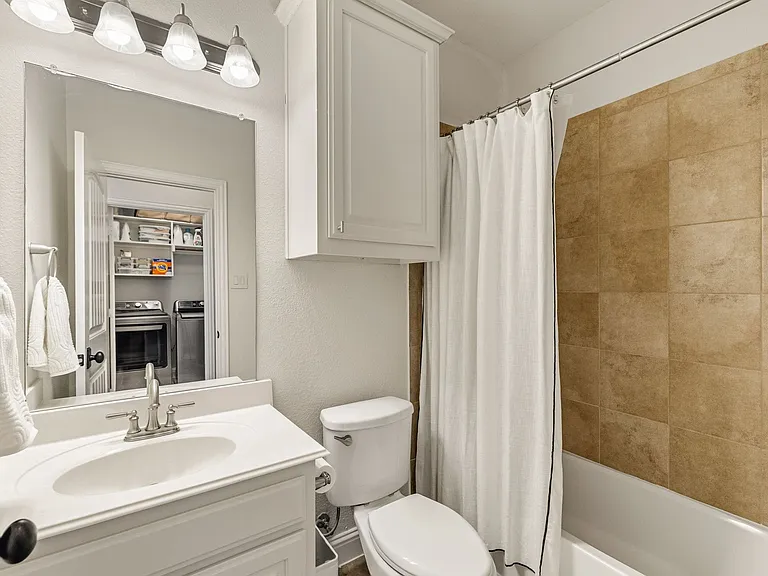 8405 Saint Clair Dr — Photo 17