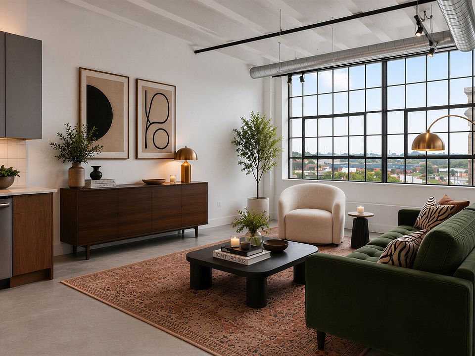 Industrial Loft Living Room at Cole Motor Apartments in Indianapolis