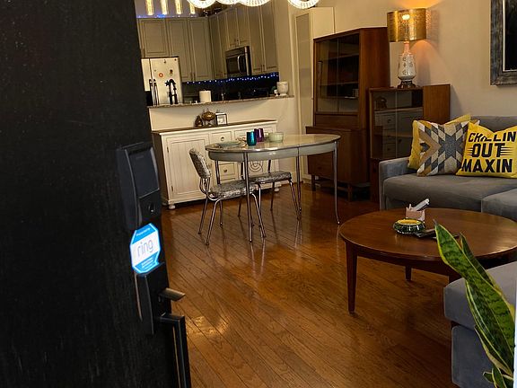 Entry from LightRail with keypad lock and Ring doorbell. Luxury upgraded LED lighting (furniture to show scale/potential).