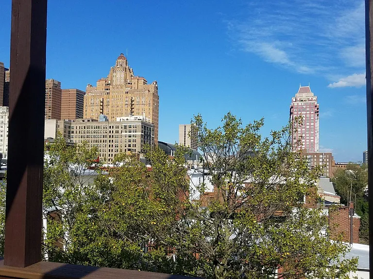 Shared rooftop deck looking east.
