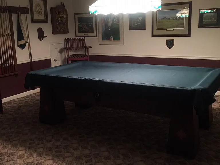 100+ year old Brunswick Pool Table - Simonis premium tournament cloth.
lower entertainment level.