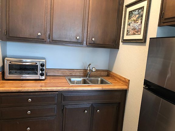 There is microwave, toaster oven and coffee maker