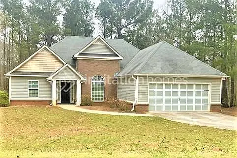 135 Rivercrest Ln Covington, GA 30016 — Photo 1