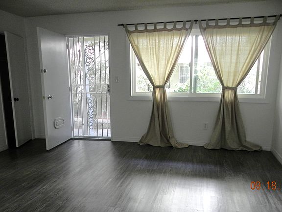 Front door facing Living room