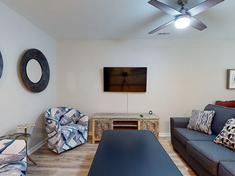 Living room area is much larger than this picture depicts.