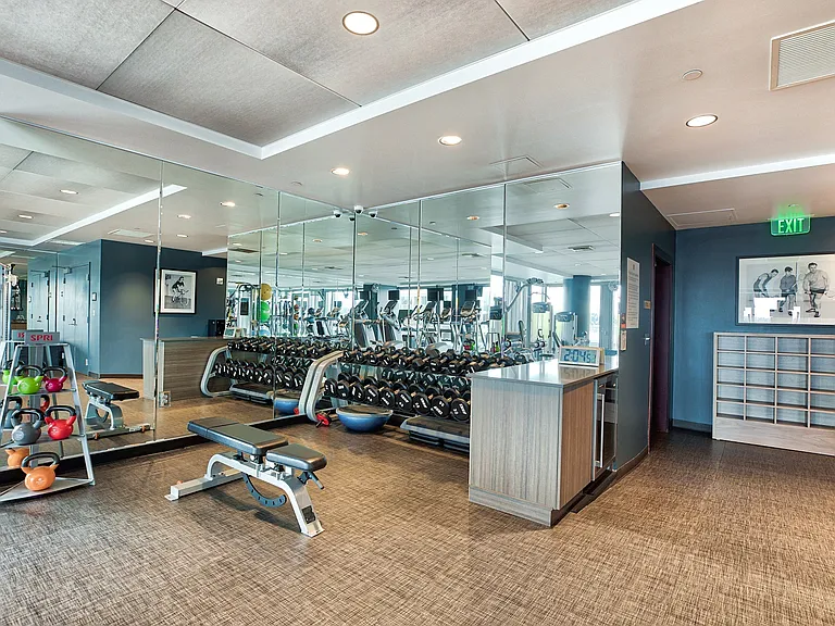 Fitness center with floor-to-ceiling windows