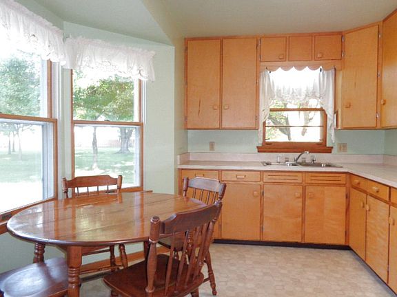 Bay window makes a nice breakfast nook with natural light!