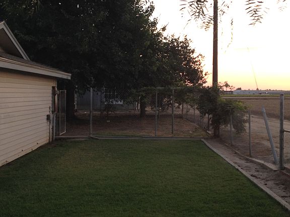Side road and side of house.
