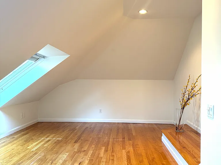 Split level bedroom with skylight.