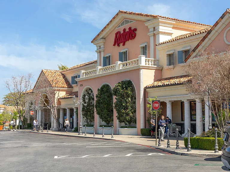 Conveniently close to grocery stores and retailers.