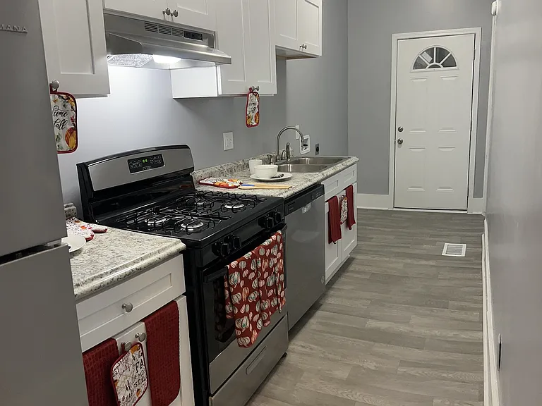 An updated kitchen with a modern color scheme and sleek, contemporary design.
