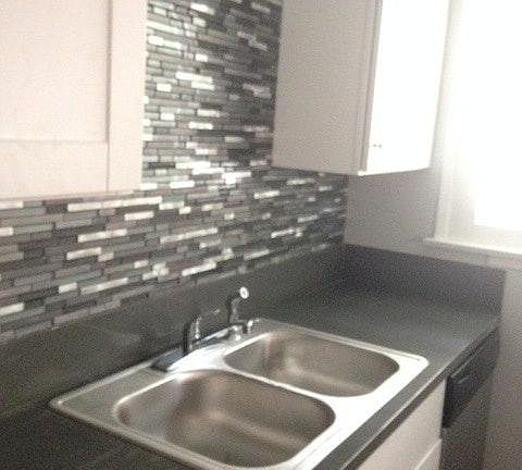 renovated kitchen with new appliances