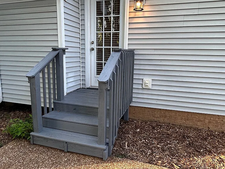 Easy access to back yard from living room, just off the kitchen