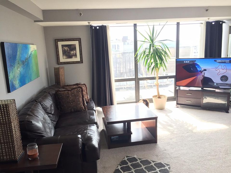 Living Room. Note: this carpet has been replaced with wood flooring.
