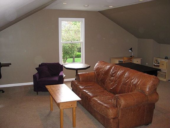 Large bonus room with built in computer desk and multi-media cabinet