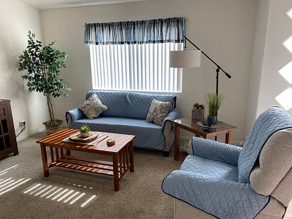 Nicely Furnished Living Room 
*Covers are to keep furniture Clean and Dust Free.