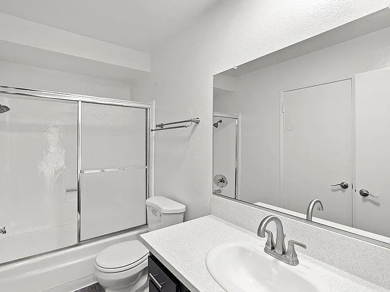 Modern styled bathroom with shower and tub.